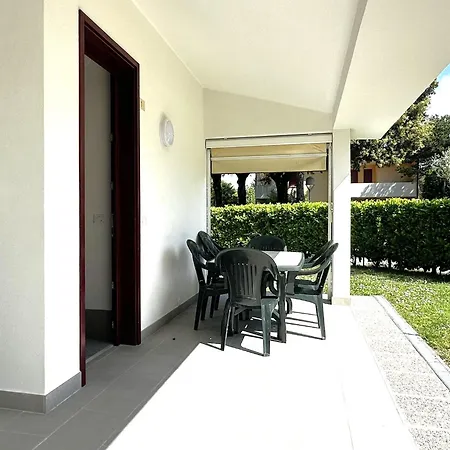 With Garden And Pool Access In Bibione